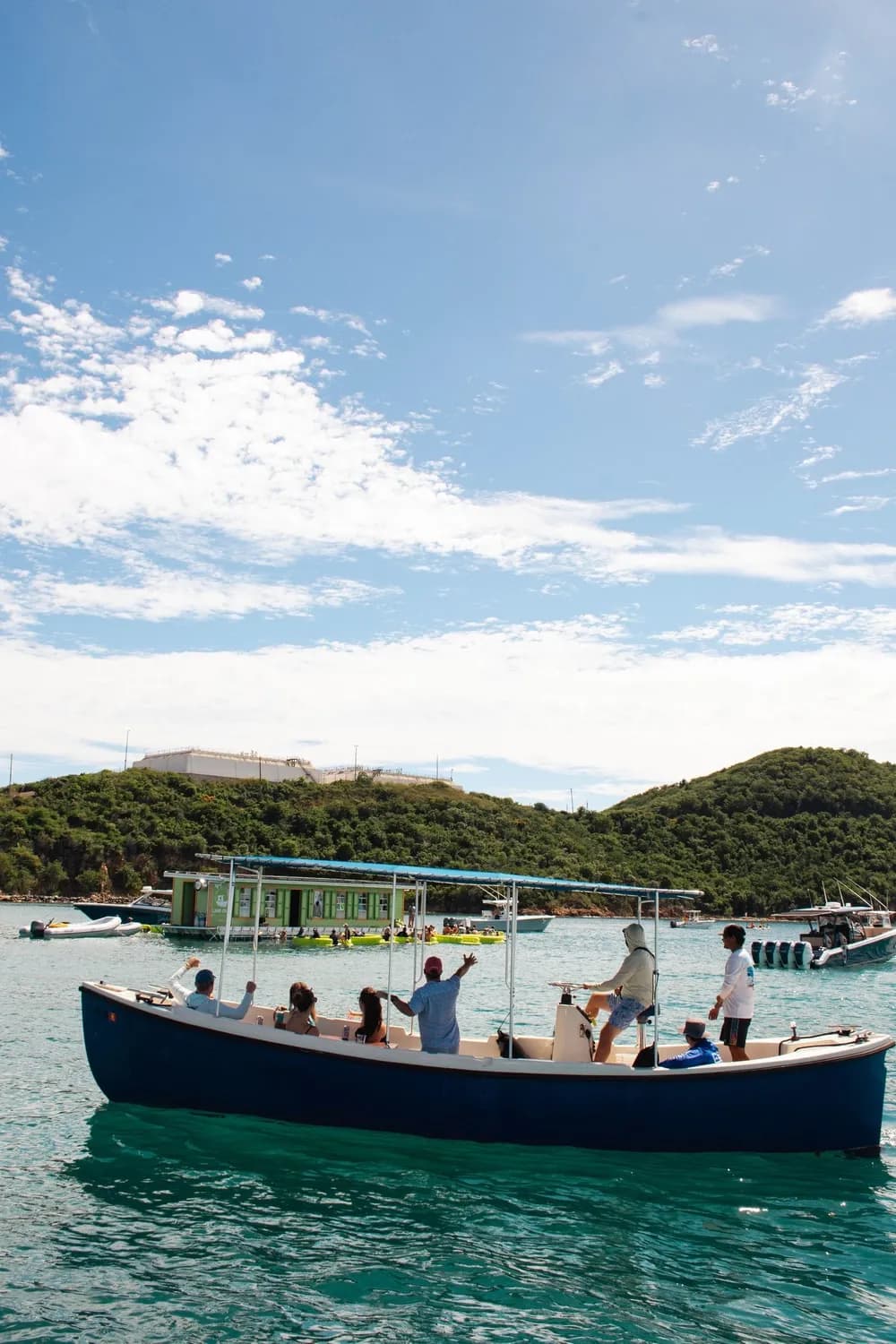 Guests snorkeling with sea turtles at Honeymoon Beach on a Taco Tug boat tour, St. Thomas