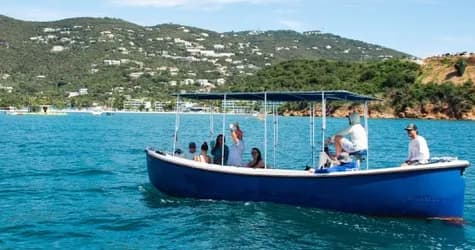 Small group of 12 guests enjoying the Taco Tug boat tour at Honeymoon Beach, Water Island